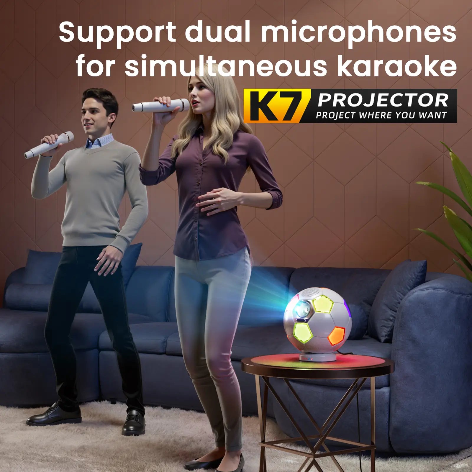 A couple enjoys a karaoke night at home, singing with the two wireless microphones connected to the K7 smart projector, which glows with colorful ambient light.