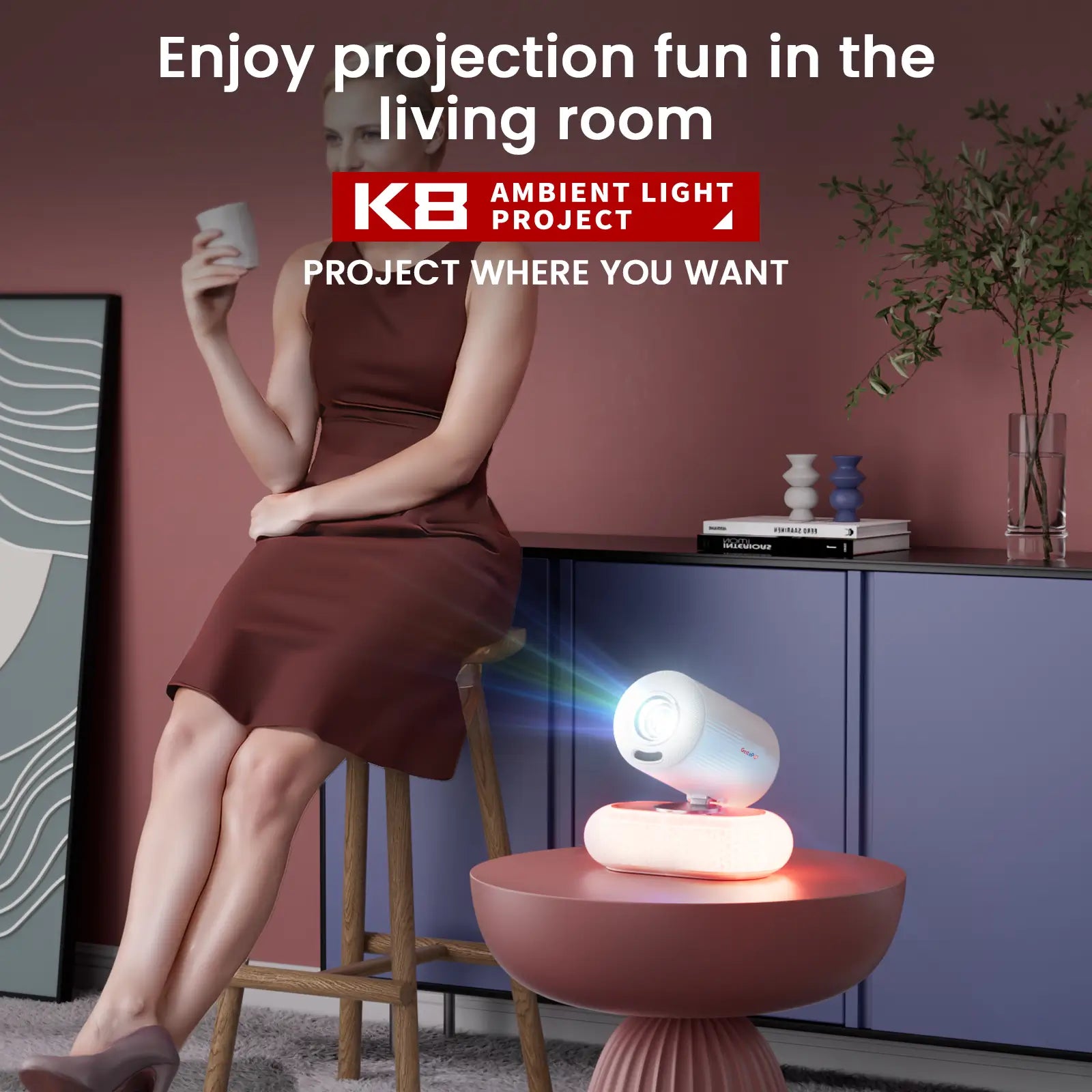 A woman enjoying a relaxing evening in her living room with the Geitepor K8 projector, showcasing its ambient light feature and suitability for home entertainment.