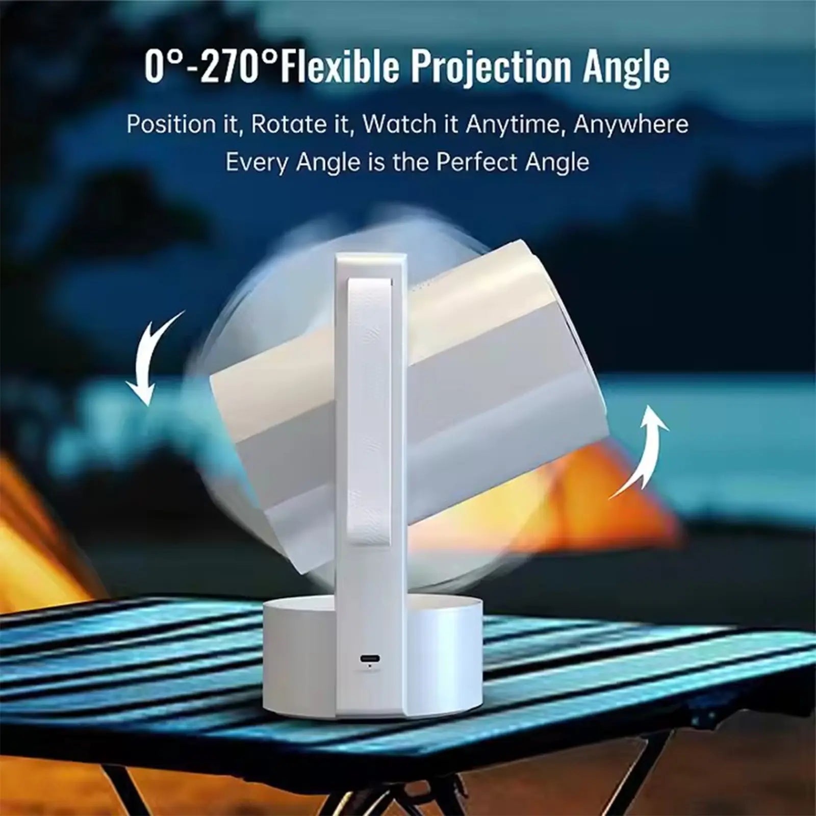 The R3P projector on a camping table showing its 0 to 270-degree flexible projection angle, making it easy to aim at a screen or ceiling.